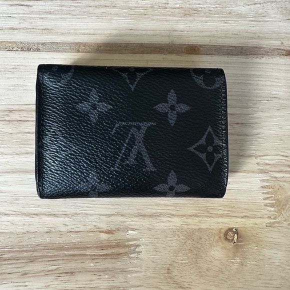 Louis Vuitton
Monogram Eclipse Leather Compact Wallet - Picture 3 of 12